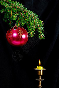 红球和蜡烛仪式文化传统火焰辉光季节异国照明烛光灯芯图片