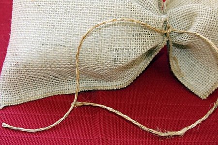 假麻袋黄麻礼物细绳棉布纺织品乡村棕色麻布组织红色图片