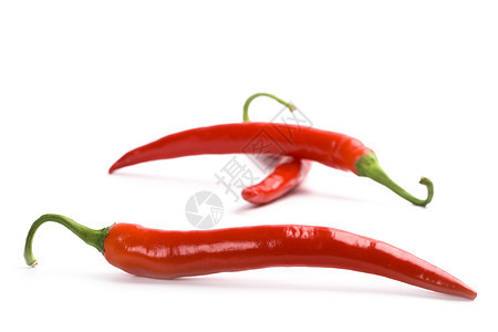 三种红辣椒辣椒香料食物蔬菜白色绿色宏观水果红色活力图片