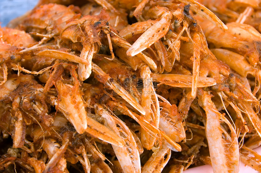 炸螃蟹餐厅甲壳红色午餐辣椒动物烹饪美食贝壳油炸图片