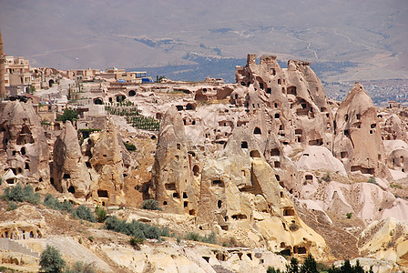 土耳其卡帕帕多西亚晴天房子火鸡爬坡地质学全景石头洞穴编队住宅图片