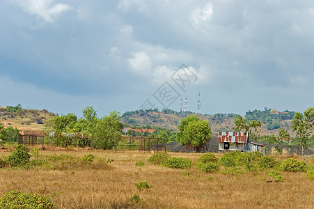 坎布迪乡村小屋高棉语场地场景田园太阳村庄农村蓝色海滩图片