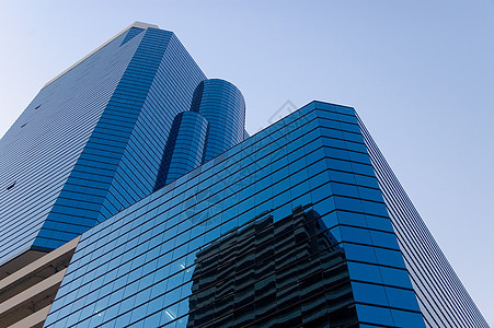 摩天大楼镜子建筑反射城市办公室结构蓝色窗户天空外观图片