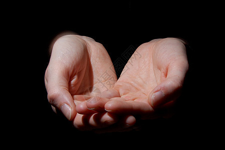 黑上空手手指宗教帮助贫困机构黑色背景图片