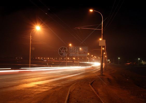 夜间公路车辆街道旅行头灯城市大灯路灯灯光条纹景观图片