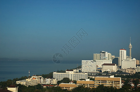 海岸上的摩天大楼海岸线海湾天际建筑学热带汽车蓝色支撑建筑海滩图片