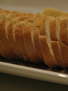 新鲜切片面包推介会奶制品小吃服务展示用餐午餐盘子脆皮背景图片