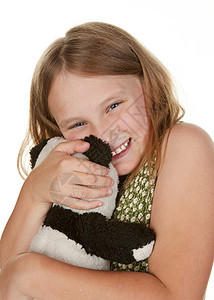 女孩拥抱她的泰迪熊女性孩子白色青少年图片