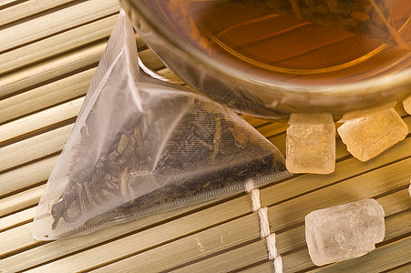 白茶 尼龙茶袋和糖桌子香料食物液体仪式宏观饮食时间味道异国图片
