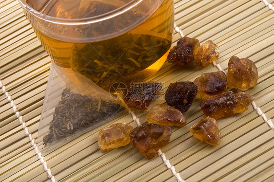 白茶 尼龙茶袋和金糖液体香料异国早餐金子味道草本植物玻璃饮食生活图片