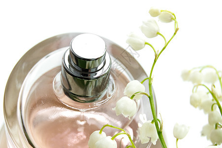 香料粉色香味宏观香水百合花瓣瓶子白色图片