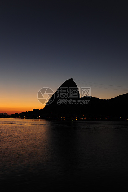 里约热内卢苏日升 甘糖洛瓦夫山反射橙子旅行旅游地平线地标阳光观光日出蓝色图片