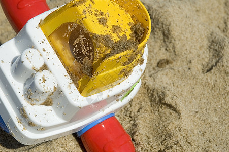 海滩玩具红色海洋天堂孩子假期旅行蓝色娱乐热带风景图片
