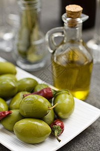 橄榄和油美食框架盘子文化烹饪胡椒玻璃瓶子调味品宏观图片