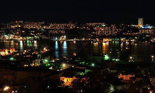 夜间城市风景海港蓝色码头天空港口星星支撑运输建筑照明图片