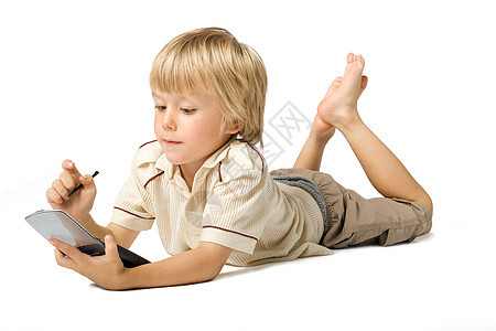 带PDA的男孩爱好电子产品孩子学习金发快乐电脑教育享受幼儿园图片