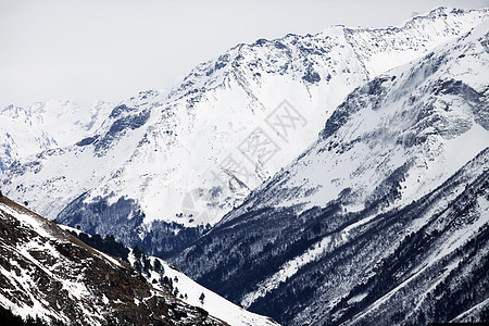 山丘和雪雪天空冻结旅行蓝色旅游冰川闲暇太阳山峰晴天图片