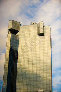 玻璃高升起和云彩的图像成功高楼地标财富工作天空市中心建筑学建筑物商业图片