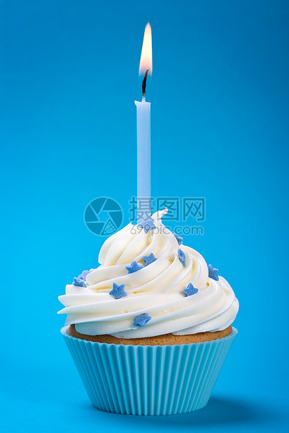蓝生日蛋糕食物星星蛋糕烘烤点燃家庭背景蜡烛饮食烘焙图片