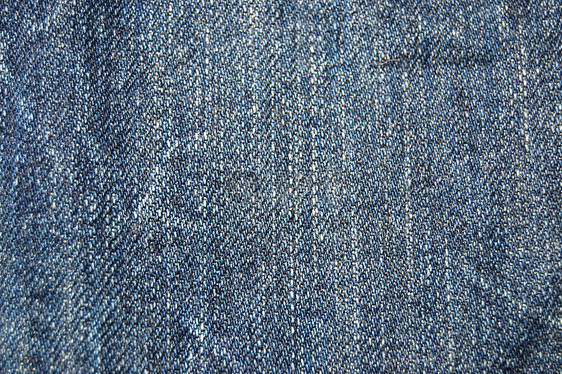 牛仔裤纹理缝纫帆布刀具力量宏观裁缝蓝色棉布牛仔材料图片