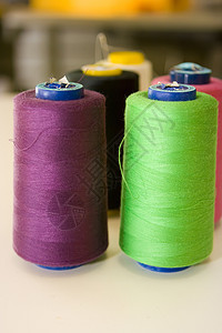 线索工厂缝纫机手指缝纫下摆制造厂工具纺织品材料窗帘细绳高清图片素材