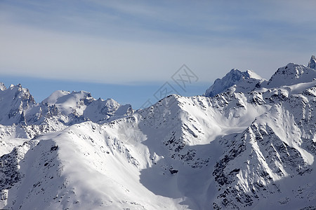 山丘和雪雪旅行登山冻结闲暇爬坡天空山峰土地旅游阳光图片