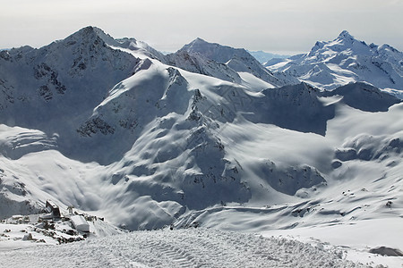 山丘和雪雪冻结闲暇爬坡旅游太阳登山天空山峰季节冰川图片