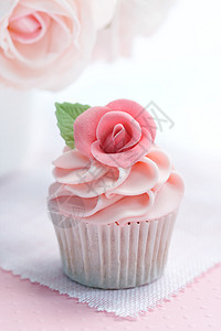 玫瑰纸杯蛋糕磨砂装饰食物烘烤冰镇玫瑰用餐奢华甜点粉色图片