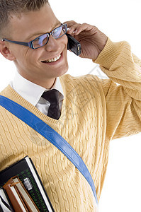 穿着眼镜在电话上说话的聪明学生图片
