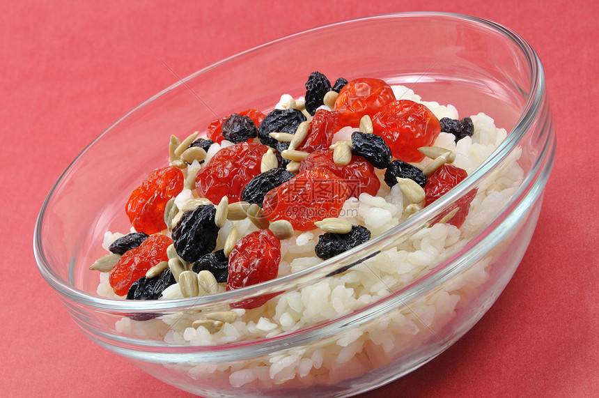 在透明碗中与干果和日葵种子一起大米白米饭背景美食小吃味道宏观营养食欲维生素菜单图片