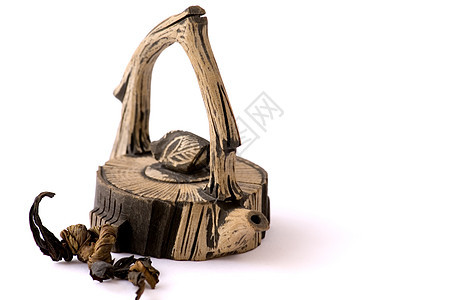 中国陶瓷茶壶饮料制品文化竹子液体黏土草本植物石头岩石条纹图片
