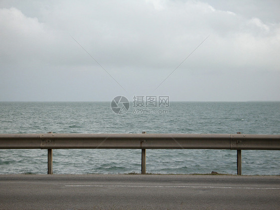 热带海洋观沥青波浪栅栏护栏航程海景支撑旅行警卫路面图片