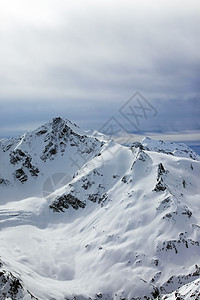 下雪山脉蓝色高山天空冰川暴风雪太阳阳光高度阴霾风景图片