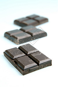 深巧克力食物积木蓝色食品糖果背景图片