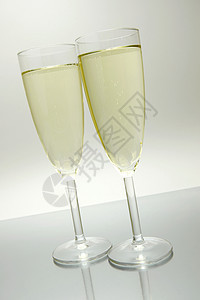 闪耀的葡萄酒黑色酒精派对眼镜长笛庆典瓶子玻璃白色饮料图片