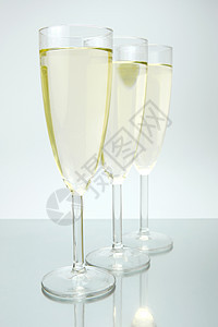 闪耀的葡萄酒派对长笛眼镜玻璃饮料庆典瓶子白色黑色酒精图片