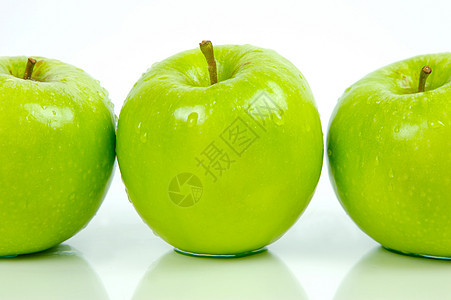 绿色苹果白色食物背景图片