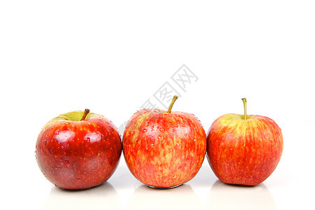 红苹果白色红色食物图片