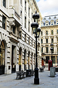 伦敦街大街旅行石头盒子电话地面路面行人摊位景观图片
