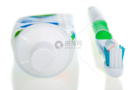 牙刷和牙膏管塑料条纹药品牙齿衰变打扫宏观白色浴室牙医图片