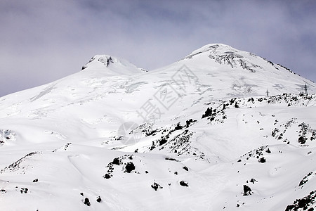 Elbrus 电子远足冰川太阳蓝色爬坡晴天天空旅行登山冻结图片