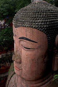 佛地标纪念碑上帝旅行雕刻爬坡岩石宗教山腰石头图片