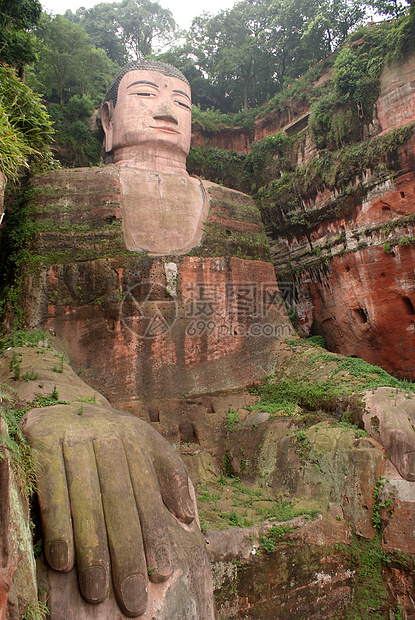 佛爬坡雕刻石头岩石洞穴山腰纪念碑宗教遗产上帝图片