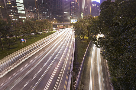 交通夜间景观市中心天际运输旅行街道摩天大楼城市蓝色运动图片