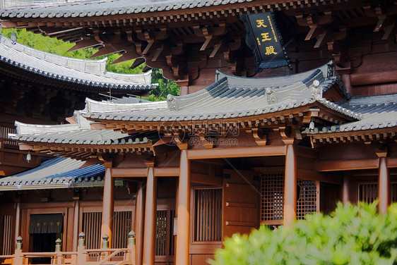 寺庙花园建筑佛教徒木头大厅雕像尼姑庵观光游客访问图片
