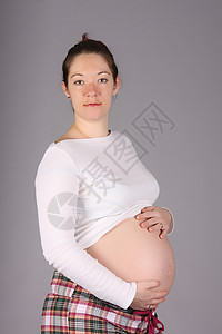 怀孕孕妇的肚子生活母性婴儿衣服女性母亲妻子女孩孩子工作室图片
