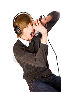 年轻人唱歌流行音乐演员男生喜悦乐趣男人耳机音乐家歌手男性图片