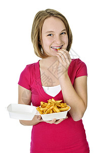 带薯条的少女女性零食白色筹码垃圾营养土豆油炸女孩们食物图片