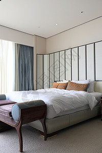 旅馆房间住宅酒店床单装饰奢华椅子地面套房建筑学商业图片
