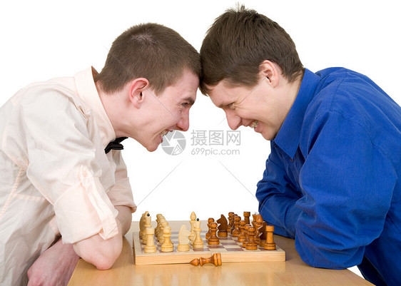 男孩下象棋争议战略侵略性领导男性棋子木板男人思维前额图片